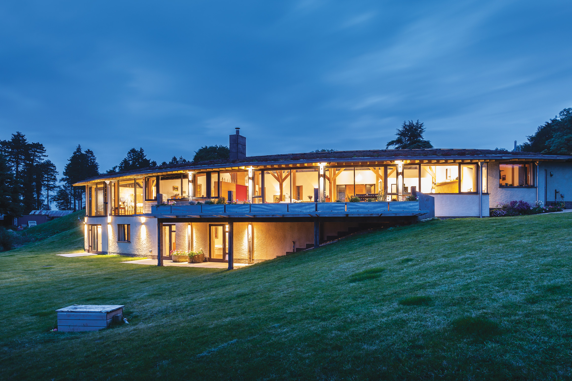 Exterior of curved modern oak home