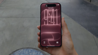 iPhone 18 Pro in Burgundy in hand at Apple Surprise and Shine