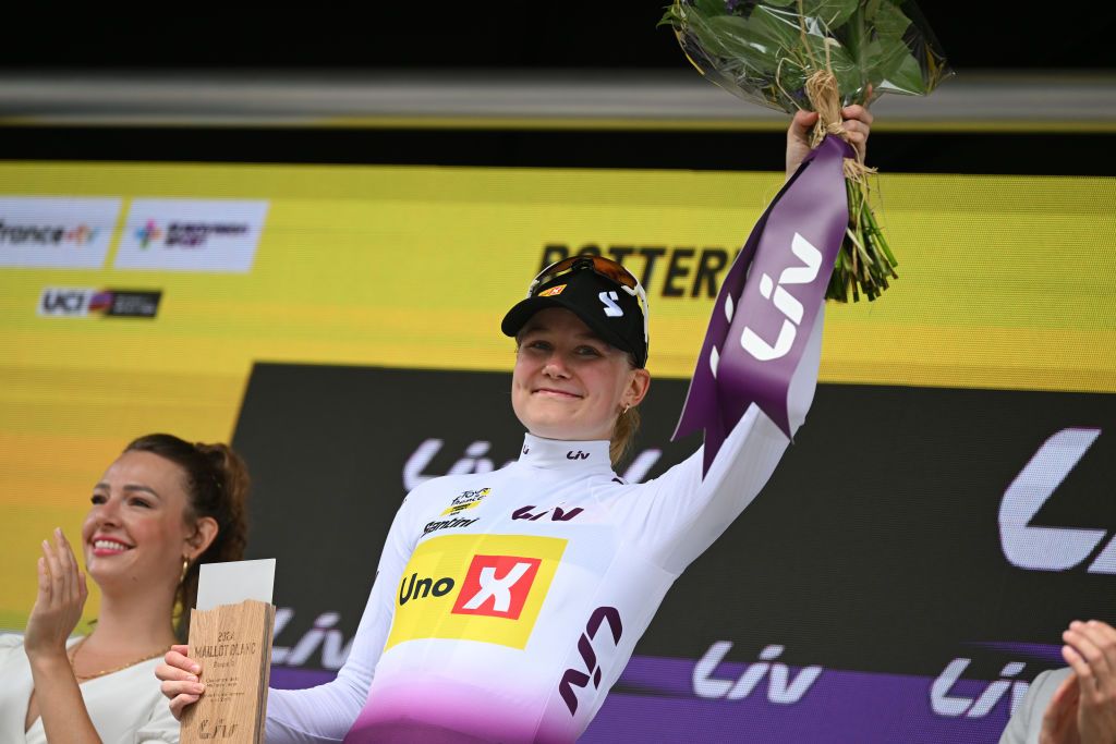 DORDRECHT NETHERLANDS AUGUST 13 Anniina Ahtosalo of Filand and Team UnoX Mobility celebrates at podium as White best young jersey winner during the 3rd Tour de France Femmes 2024 Stage 2 a 679km stage from Dordrecht to Rotterdam UCIWWT on August 13 2024 in Dordrecht Netherlands Photo by Dario BelingheriGetty Images