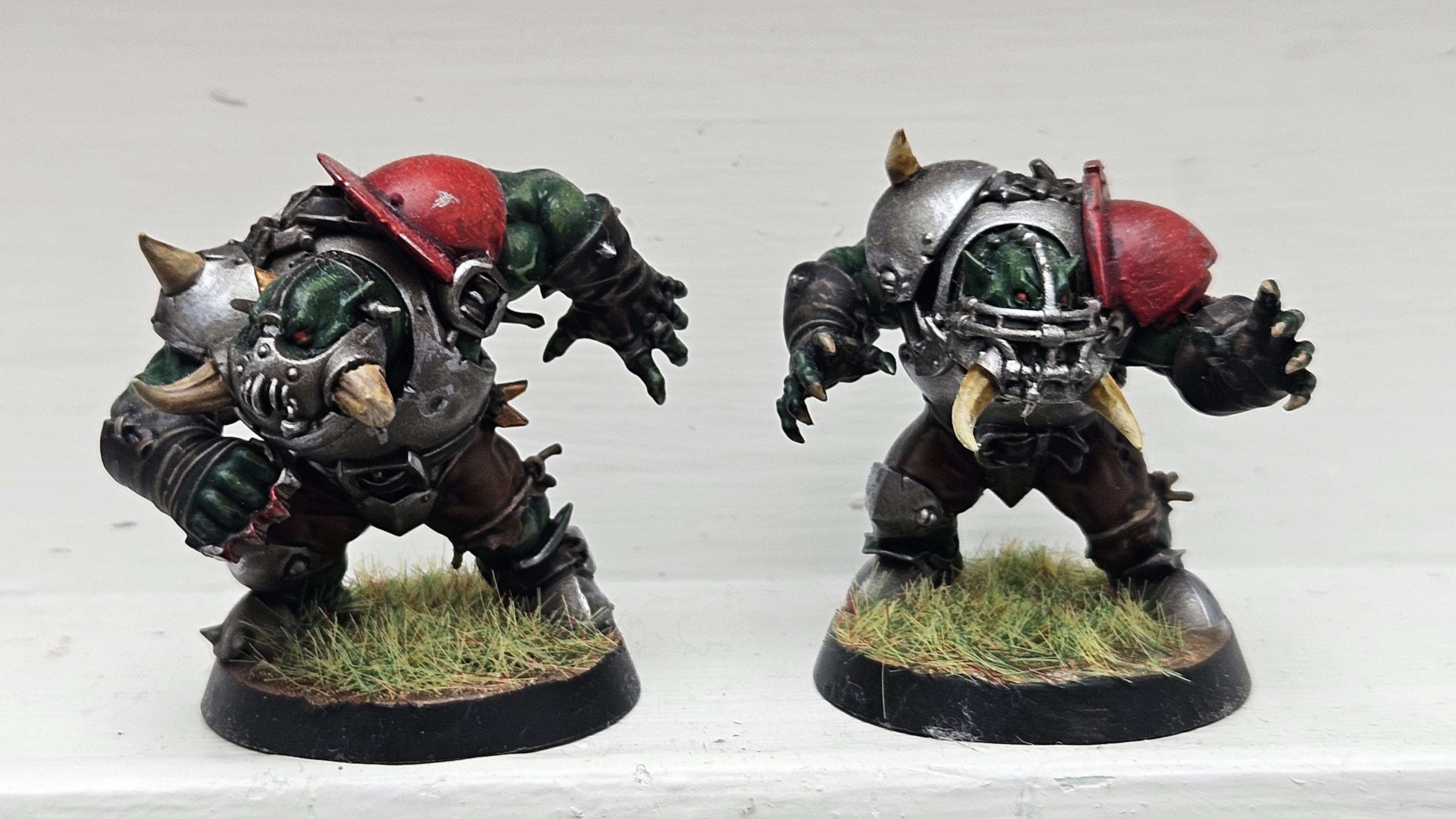 A pair of orcs, painted by Will Salmon.