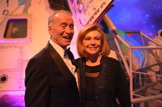 Walt Cunningham, with his wife Dot, pose in front of the Apollo 7 command module at the Frontiers of Flight Museum in Dallas on Saturday, Oct. 20, 2018. The couple were the guests of honor at a 50th anniversary gala for the Apollo 7 mission.