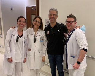 Andrea Agostini with medical staff from the UAE hospital
