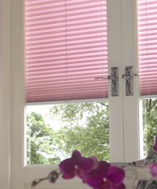 Pink blinds by Thomas Sanderson in conservatory