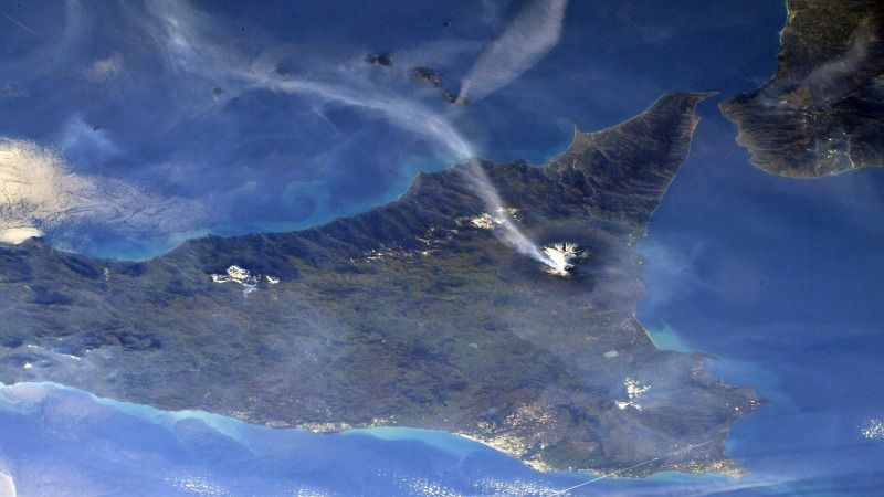 Mount Etna sends out a plume visible from space in this Feb. 12, 2022, photo from ESA astronaut Matthias Maurer.