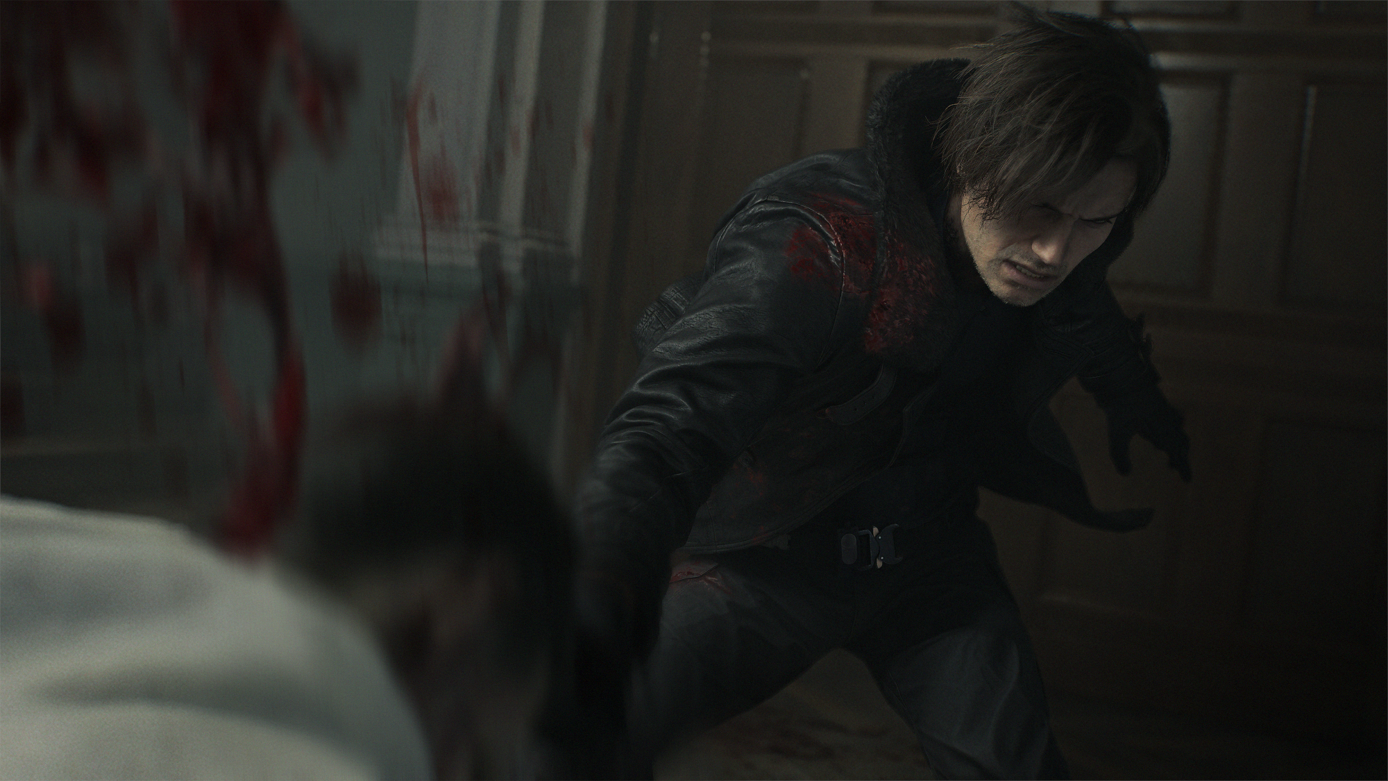 Resident Evil Requiem: Leon using a quick-time action on a zombie.
