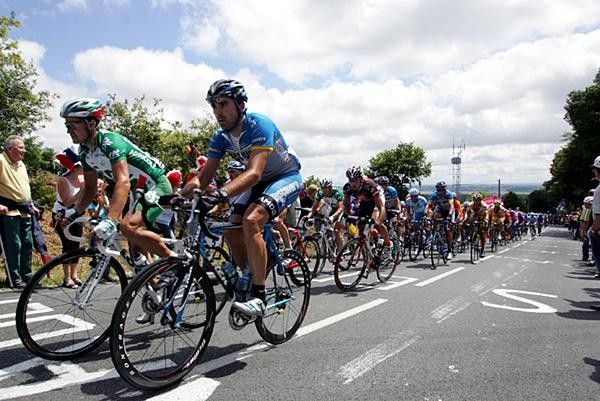 Benjamin Noval Gonzalez (Discovery) makes it over the climb with the rest of the bunch trailing.