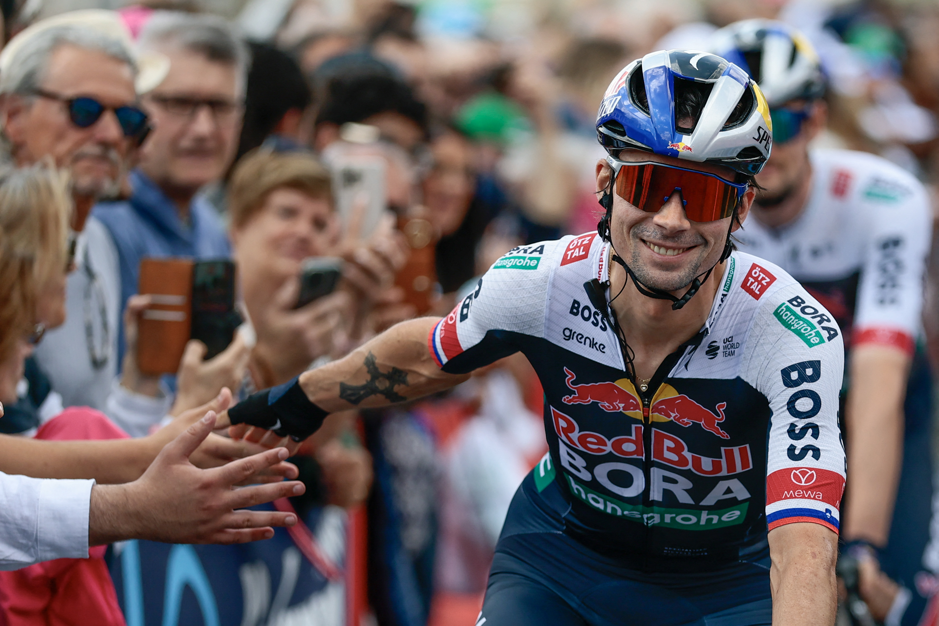 Red Bull-Bora-Hansgrohe&#039;s Slovenian rider Primoz Roglic greets the fans prior to the start of the 14th stage of the 108th Giro d&#039;Italia cycling race of 195kms from Treviso in Italy to Nova Gorica in Slovenia on May 24, 2025. (Photo by Luca Bettini / AFP) (Photo by LUCA BETTINI/AFP via Getty Images)