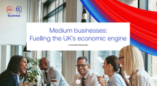 Whitepaper cover with title over an image of business colleagues laughing and smiling