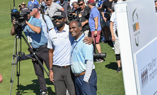 Sahith Theegala and his dad pose for a photo at the 2022 WM Phoenix Open