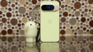 Google Pixel 10 in Lemongrass against a bubbly backsplash