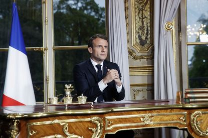 French President Emmanuel Macron gives a televised address