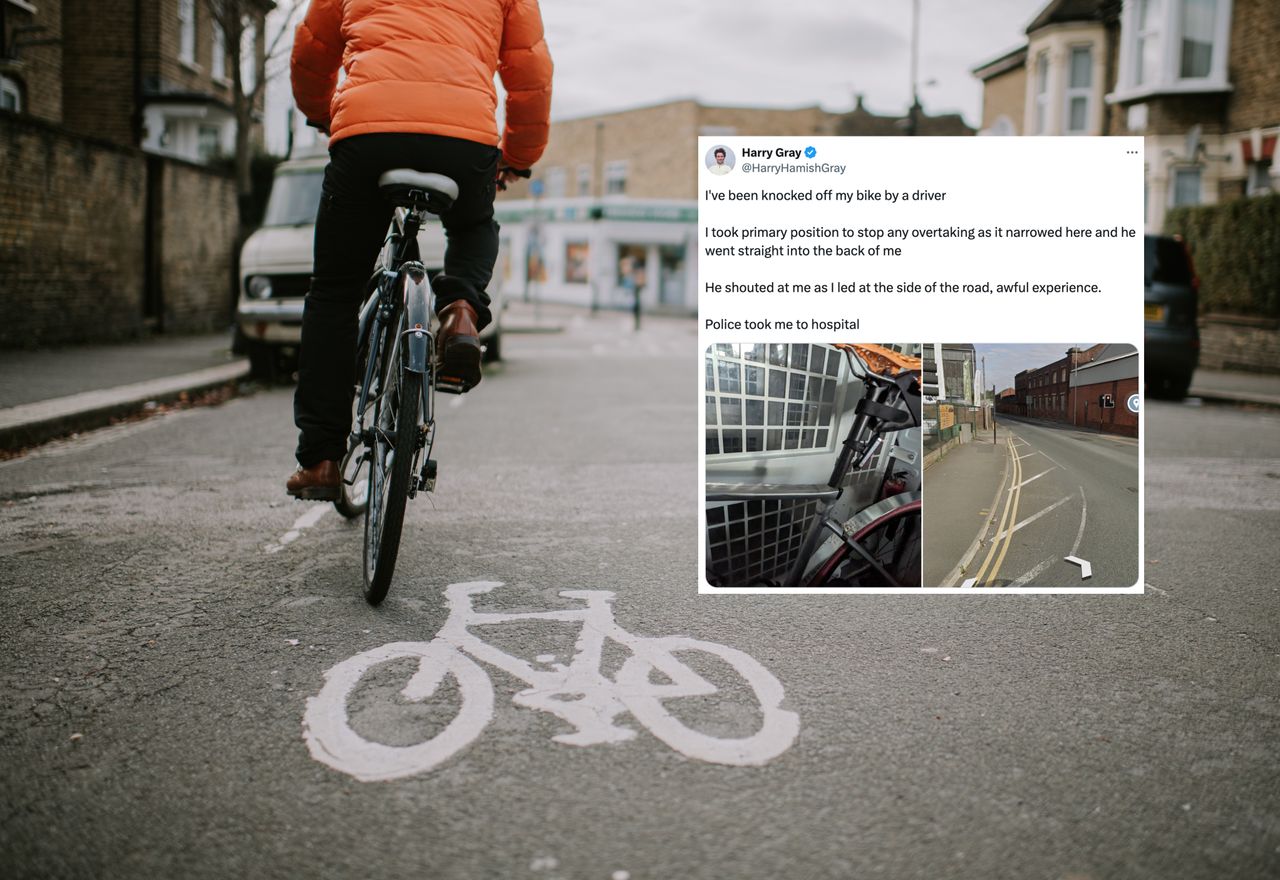 A cyclist in a residential area with a tweet embossed on top