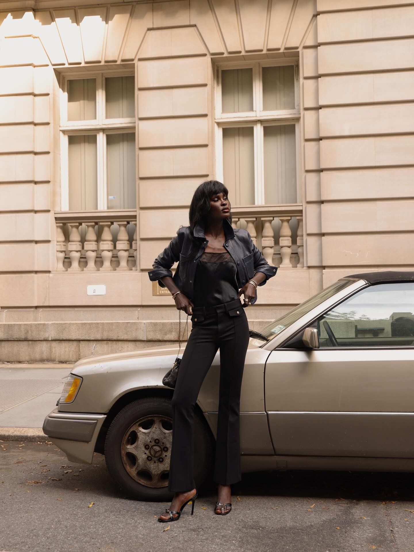 Woman wearing a fall 2026 outfit with flared pants.