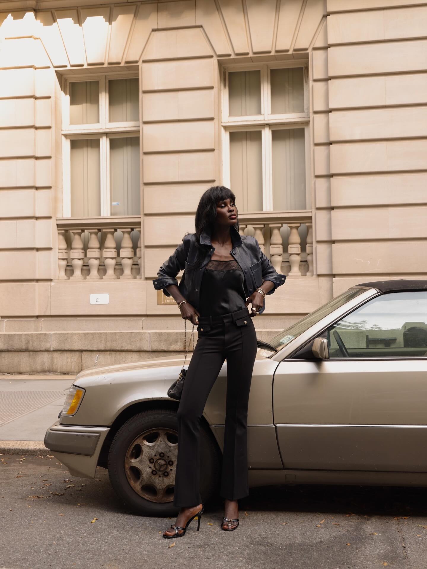 Woman wearing a fall 2026 outfit with flared pants.