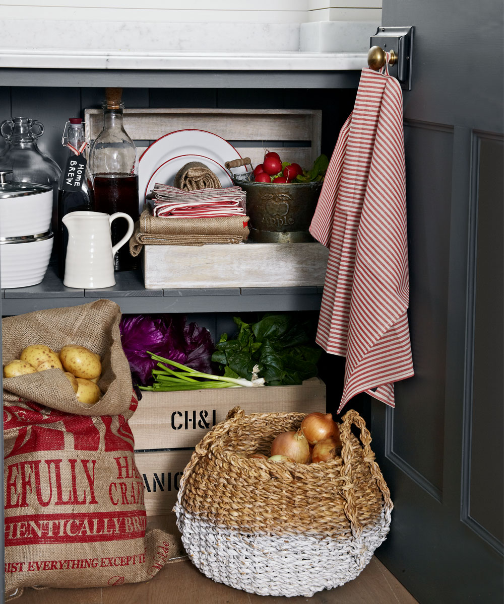 kitchen with blue door kitchen rack and wooden basket