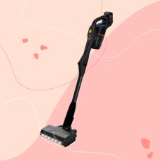 Bosch Unlimited 10 vacuum on a pink background