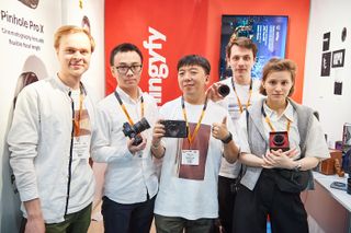 Thingyfy CEO Boz Zou (middle), on the Thingyfy/Kamlan stand at The Photography Show 2019