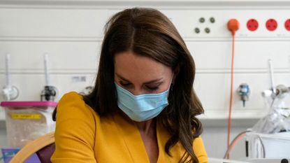 Kate Middleton cradles tiny baby girl in 'touching' moment at maternity unit 