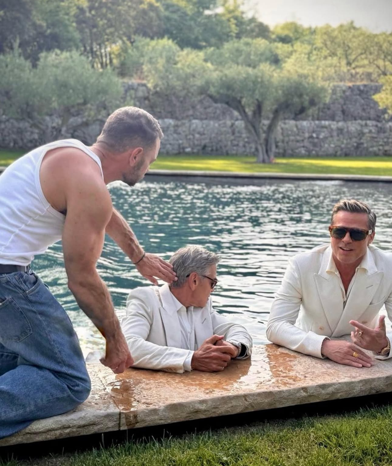 Dimitris Giannetos with George Clooney and Brad Pitt
