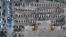 Iranian state media photo showing burial sites for school girls killed in suspected U.S. airstrike on elementary school