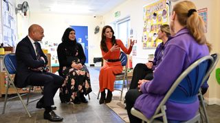 Catherine, Princess of Wales sits down as she talks with early childhood educators during her visit to Foxcubs Nursery on January 18, 2023