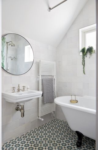small white bathroom with zellige tiles by Fiona Duke