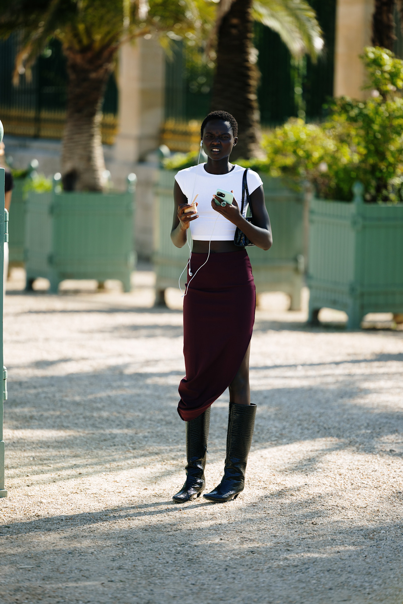 outfits of knee high boots and midi skirts