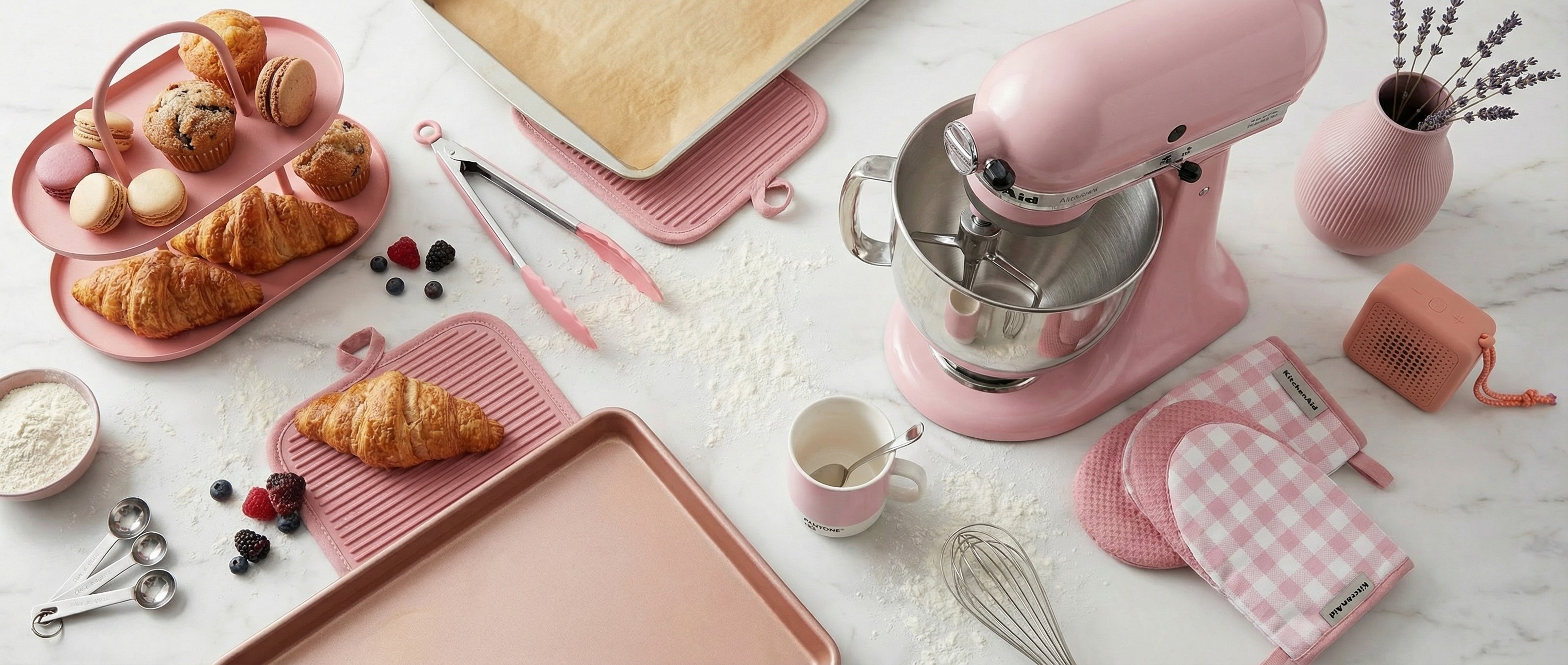 Pink kitchen accessories on kitchen counter