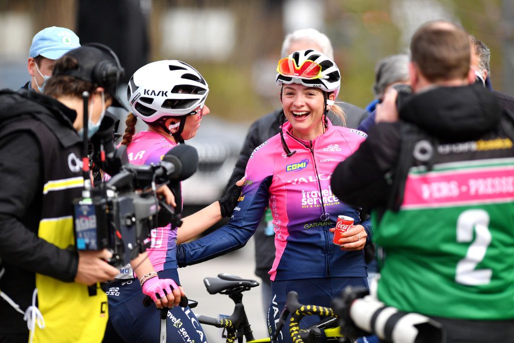 WAREGEM BELGIUM MARCH 30 Chiara Consonni of Italy R celebrates the victory with her teammate Alice Maria Arzuffi of Italy and Valcar Travel Service Team L after the 10th Dwars door Vlaanderen 2022 Womens Elite a 120km one day race from Waregem to Waregem DDV22 DDVwomen on March 30 2022 in Waregem Belgium Photo by Luc ClaessenGetty Images