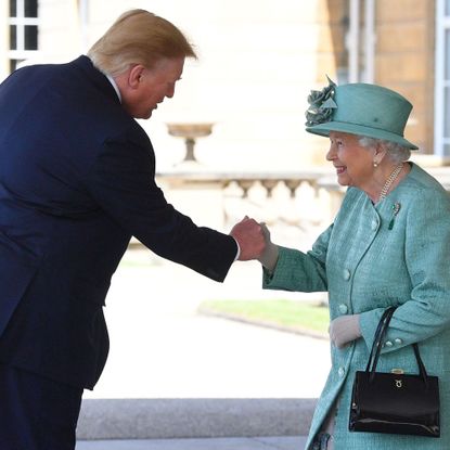 topshot britains queen elizabeth ii r shakes hands with us president donald trump during a welcome ceremony at buckingham palace in central london on june 3, 2019, on the first day of the us president and first ladys three day state visit to the uk britain rolled out the red carpet for us president donald trump on june 3 as he arrived in britain for a state visit already overshadowed by his outspoken remarks on brexit photo by victoria jones pool afp photo credit should read victoria jonesafp via getty images