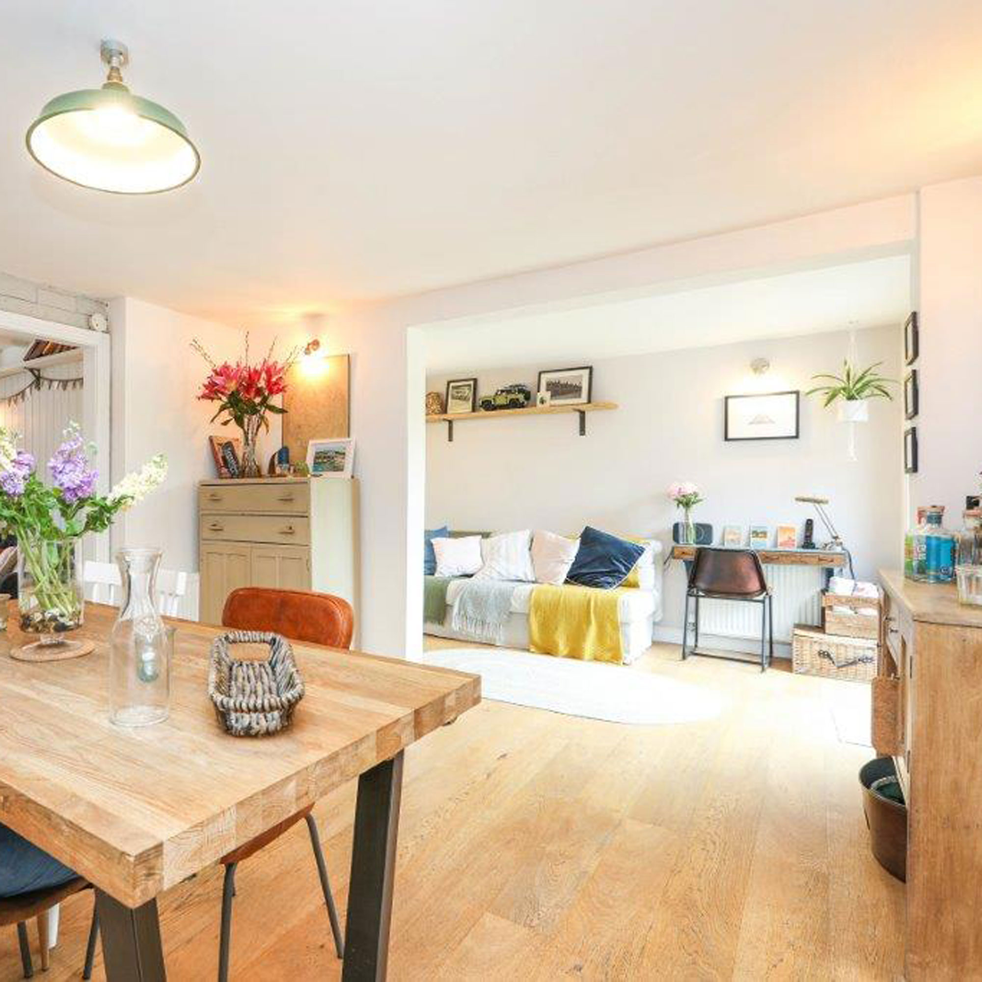 open plan dining living room with oak engineered flooring