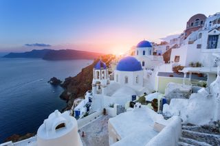 sunset in santorini - one of the best places to visit in greece