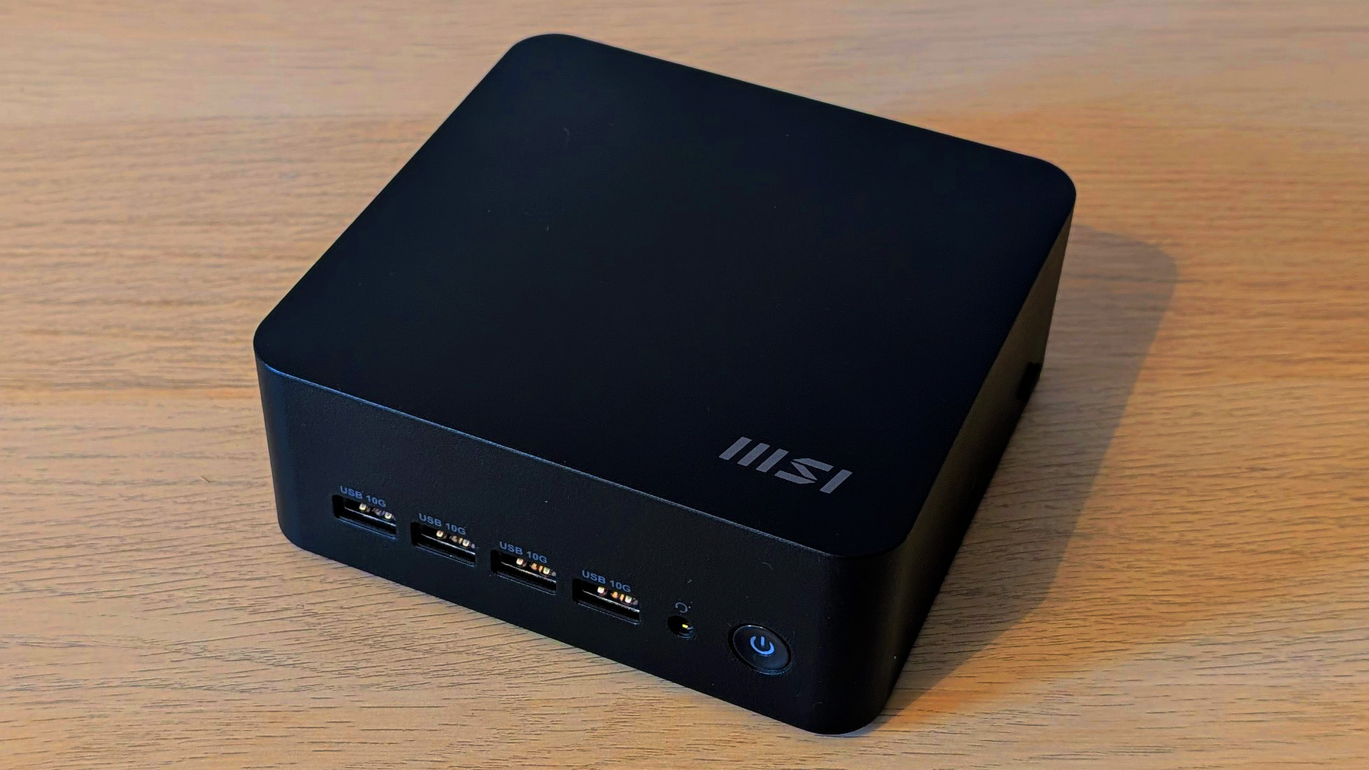 The MSI Cubi Z AI 8M on a desk