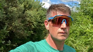 Man wearing Dynafit Ultra Evo Sunglasses