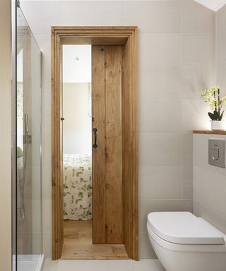 small ensuite bathroom with sliding door