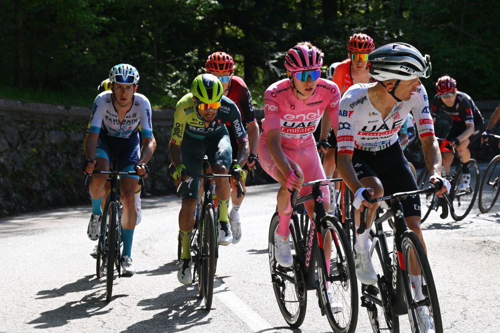 PRATI DI TIVO ITALY MAY 11 LR Antonio Tiberi of Italy and Team Bahrain Victorious Daniel Martinez of Colombia and Team BORA hansgrohe Tadej Pogacar of Slovenia and UAE Team Emirates Pink Leader Jersey compete in the breakaway during the 107th Giro dItalia 2024 Stage 8 a 152km stage from Spoleto to Prati di Tivo 1451m UCIWT on May 11 2024 in Prati di Tivo Italy Photo by Tim de WaeleGetty Images