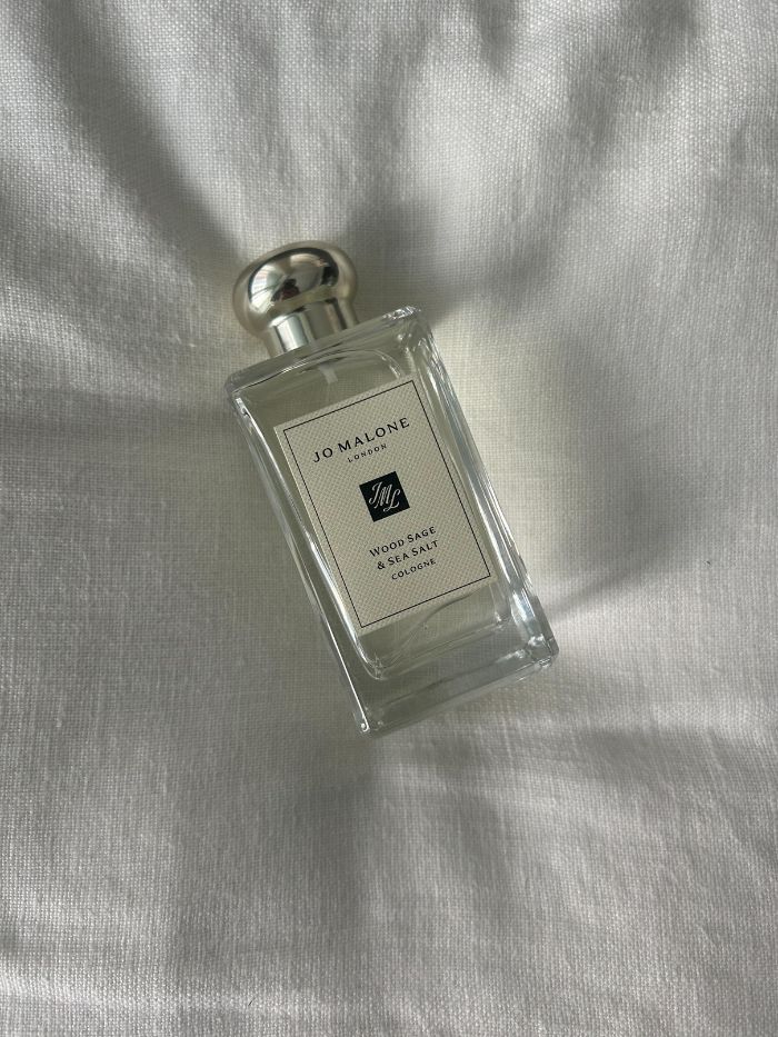 Marine perfumes on a white linen background