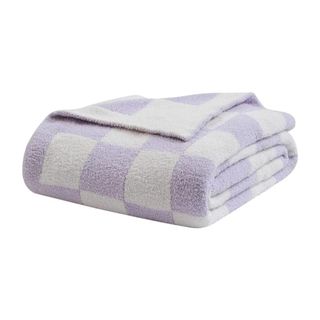 A white and purple checkered blanket