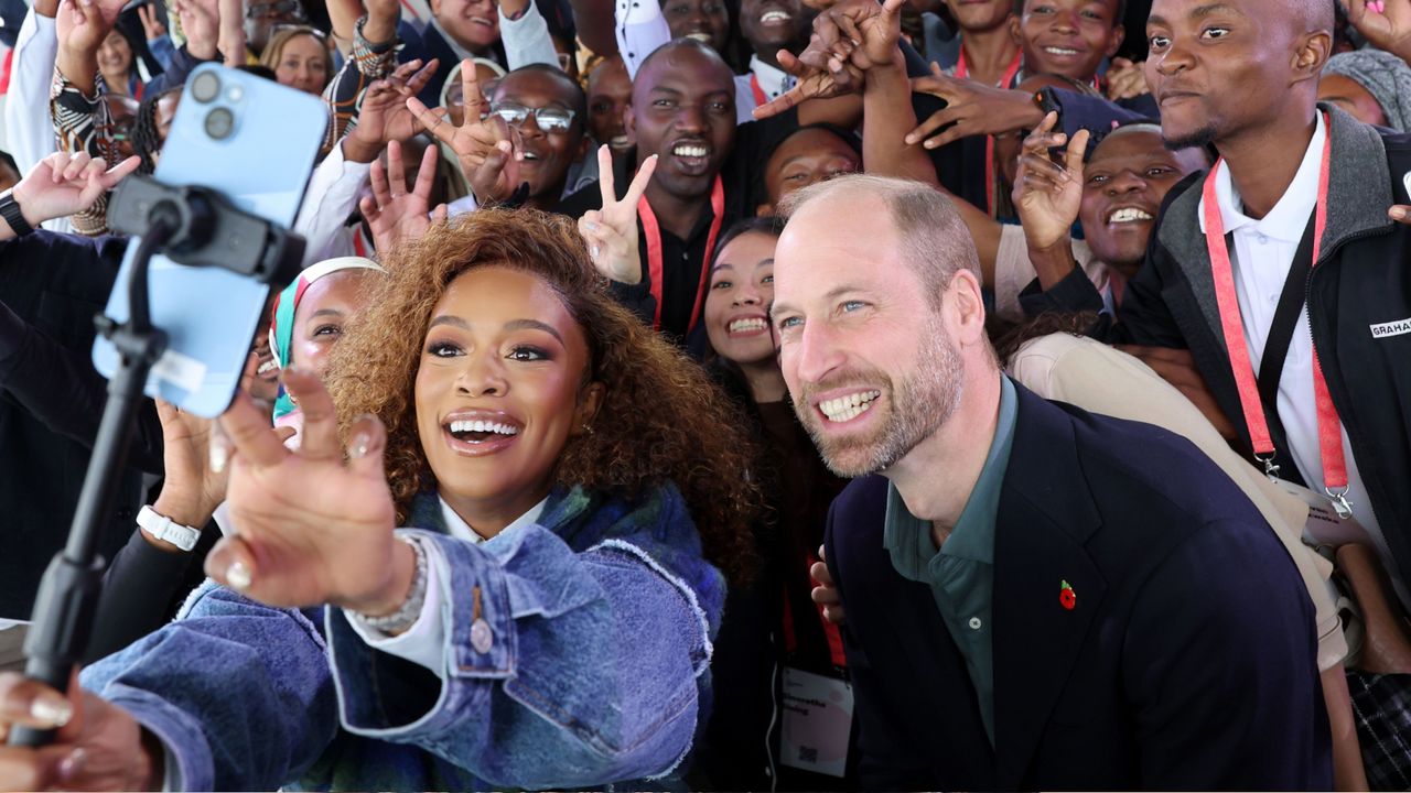 Prince William taking selfies with fans