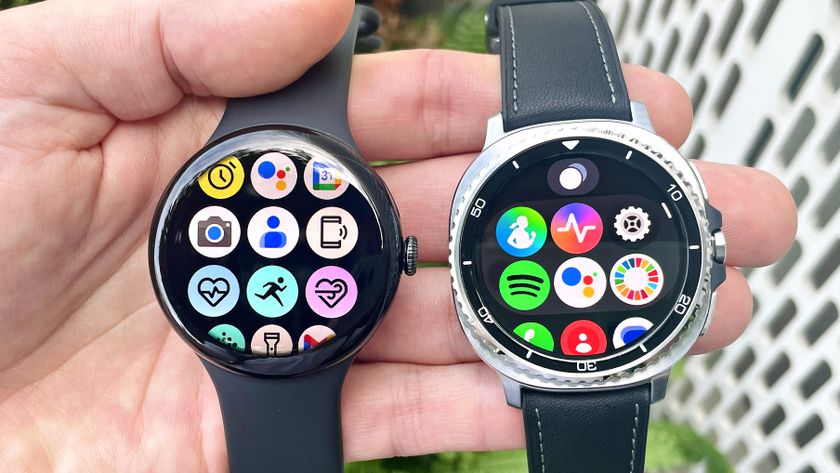 Close-up of the Google Pixel Watch 3 XL next to the Samsung Galaxy Watch 8 Classic; both are in a user&#039;s hand