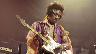 Jimi Hendrix performs onstage