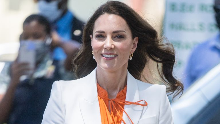 Kate Middleton white suit—Catherine, Duchess of Cambridge visits Shortwood Teacher's College on March 23, 2022 in Kingston, Jamaica. 