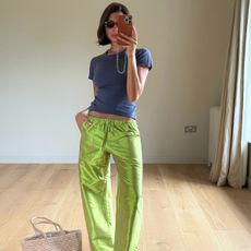 An influencer wearing taffeta pants.