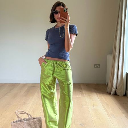 An influencer wearing taffeta pants.