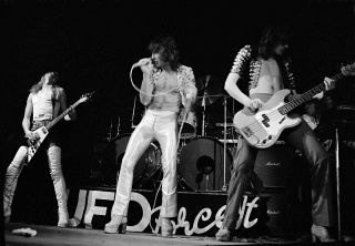 UFO onstage in 1976: L-R Michael Schenker, Phil Mogg, Pete Way