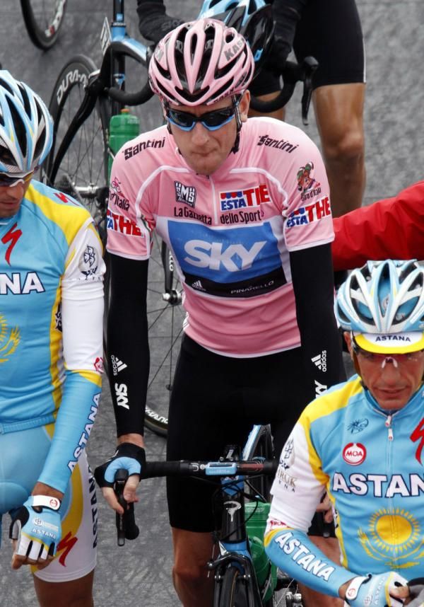 Bradley Wiggins (Team Sky) makes his way to the start in the leader's jersey
