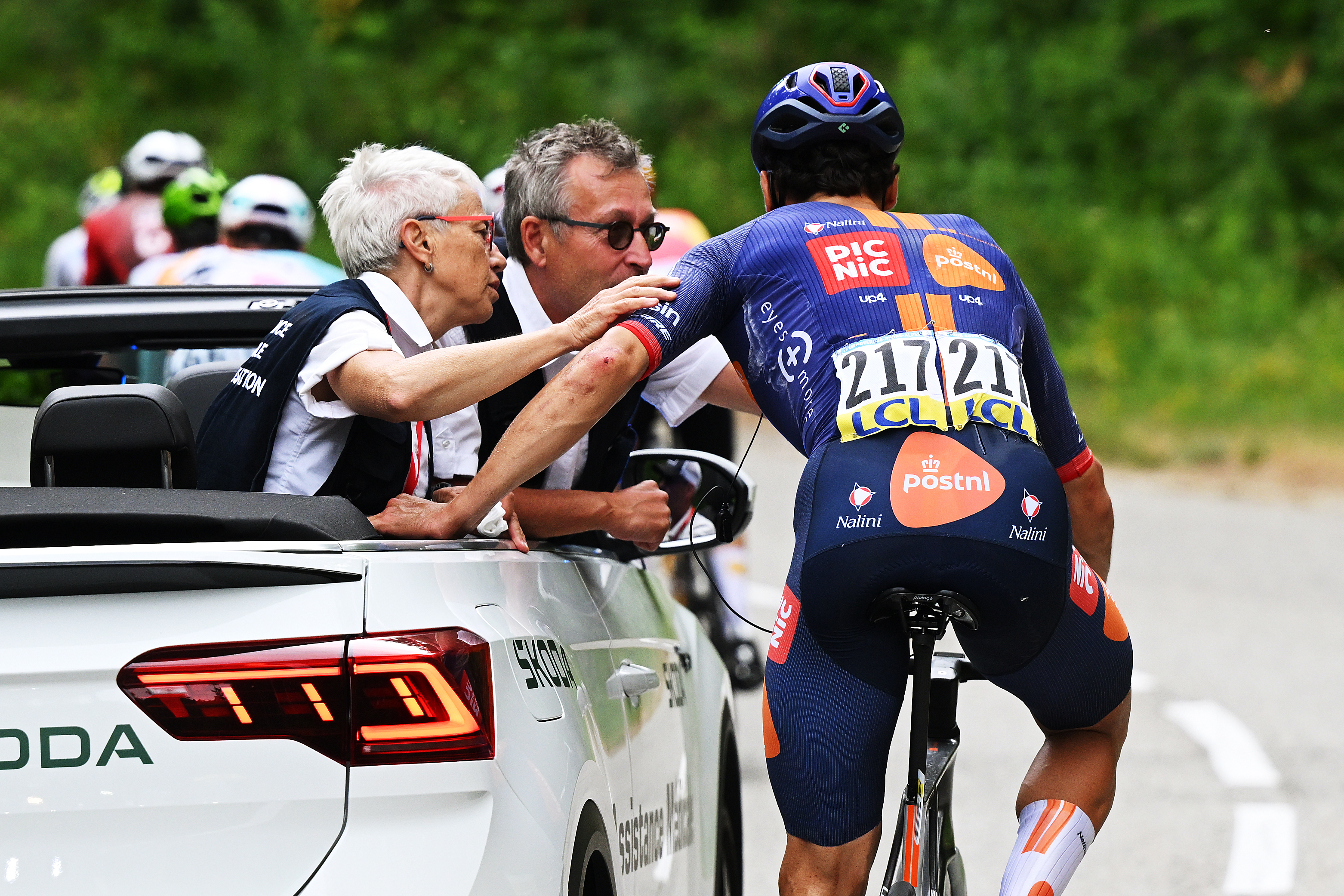 LE PUY-EN-VELAY, FRANCE - JUNE 08: Henri-Francois Renard-Haquin of France and Team Picnic PostNL is attended to by the medical team during the 78th Tour Auvergne-Rhone-Alpes 2026, Stage 2 a 234.3km stage from Saint-Martin-le-Vinoux to Le Puy-en-Velay 624m / #UCIWT / on June 08, 2026 in Le Puy-en-Velay, France. (Photo by Dario Belingheri/Getty Images)