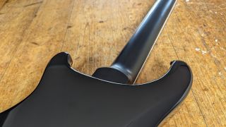 Close up of the neck joint on the PRS SE Mark Holcomb SVN