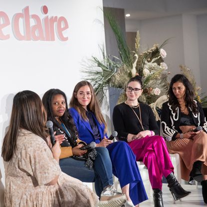 Tanya Klich speaks to panelists MUTALE NKONDE, CEO and founder of AI for the People, LAURA MODI, CEO and cofounder of baby formula company Bobbie, AMIRA FOUAD, Director of Society Communications at Google, and SALI CHRISTESON, the founder and CEO of Argent at Marie Claire's 2022 Power Trip summit.