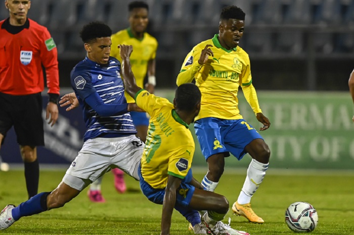 Rushine de Reuck of Maritzburg United steals the ball fromThemba Zwane of Mamelodi Sundowns FC